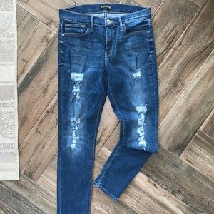 Distressed express skinny jeans